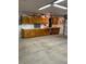 Garage features ample storage with cabinets, a countertop, and a storage vacuum at 7650 Butterscotch Ct, Las Vegas, NV 89131