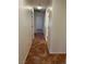 Hallway featuring neutral walls and tile flooring at 7650 Butterscotch Ct, Las Vegas, NV 89131
