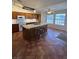 Spacious kitchen with ample counter space and an island with seating at 7650 Butterscotch Ct, Las Vegas, NV 89131