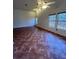 Bright living room with tile floors, and a ceiling fan at 7650 Butterscotch Ct, Las Vegas, NV 89131