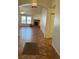 Open-concept living area with tiled floors and fireplace at 7650 Butterscotch Ct, Las Vegas, NV 89131