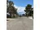 Scenic street view showcasing the neighborhood's serene atmosphere and mountain views at 7650 Butterscotch Ct, Las Vegas, NV 89131