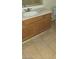 Bathroom vanity featuring wood cabinets and a white countertop and sink at 833 Aspen Peak Loop # 1524, Henderson, NV 89011