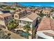 This property features a private pool, balcony, well-kept landscaping, and solar panels on the roof in a vibrant neighborhood at 841 Colina Alta Pl, Las Vegas, NV 89138