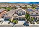 Aerial view of a neighborhood showcasing well-maintained homes and desert scenery at 841 Colina Alta Pl, Las Vegas, NV 89138