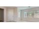 Bright living room with natural light, wood floors, and neutral paint at 841 Colina Alta Pl, Las Vegas, NV 89138