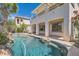 Beautiful pool with rock accents, a jacuzzi, and a view of the home's arches at 841 Colina Alta Pl, Las Vegas, NV 89138