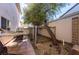 A backyard shows a hammock and space for outdoor relaxation and activities at 884 E Robindale Rd, Las Vegas, NV 89123