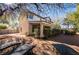 The expansive backyard features lush landscaping and provides ample space for outdoor living and recreation at 884 E Robindale Rd, Las Vegas, NV 89123