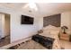 Bedroom featuring decorative wall, tile flooring, and a window view at 884 E Robindale Rd, Las Vegas, NV 89123