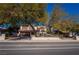 Charming two-story home with mature trees surrounding, featuring a two car garage at 884 E Robindale Rd, Las Vegas, NV 89123