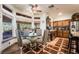 Cozy breakfast nook with large windows offering views of the backyard next to the updated kitchen at 884 E Robindale Rd, Las Vegas, NV 89123