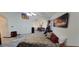 Spacious main bedroom suite featuring tile flooring and multiple doorways at 884 E Robindale Rd, Las Vegas, NV 89123