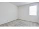 Neutral bedroom featuring plush carpet and natural light from the window at 8909 Cherry Barn St, Las Vegas, NV 89113