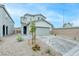 Attractive two-story home featuring a well-maintained xeriscaped front yard at 8909 Cherry Barn St, Las Vegas, NV 89113