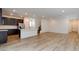Open-concept living area featuring modern hardwood floors, and lots of open space at 8909 Cherry Barn St, Las Vegas, NV 89113