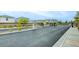 Neighborhood featuring newly paved streets and well maintained landscaping, offering a pleasant living environment at 8909 Cherry Barn St, Las Vegas, NV 89113
