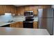 Well-equipped kitchen featuring stainless steel appliances and ample counter space at 9070 Spring Mountain Rd # 209, Las Vegas, NV 89117
