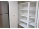 Ample pantry space featuring built-in shelving and room for storage at 9070 Spring Mountain Rd # 209, Las Vegas, NV 89117