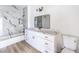 Bright bathroom showcasing marble-style tile, a tub, and a modern vanity at 9303 Gilcrease Ave # 1243, Las Vegas, NV 89149