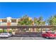 Assigned covered parking includes assigned spots, with nearby two-story residential building at 9303 Gilcrease Ave # 1243, Las Vegas, NV 89149