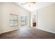 Spacious bedroom featuring a sliding glass door leading to a balcony and carpeted floors at 9490 Thunder Sky St # 102, Las Vegas, NV 89178