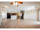 Spacious living area with tile flooring, open layout, and seamless transition to the kitchen at 9490 Thunder Sky St # 102, Las Vegas, NV 89178