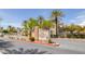 Inviting entrance to Chateau Nouveau with lush landscaping and decorative signage at 10001 Peace Way # 2351, Las Vegas, NV 89147