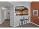 Cozy kitchenette with modern bar stools, perfect for quick meals and entertaining guests at 10001 Peace Way # 2351, Las Vegas, NV 89147