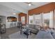 Inviting living room with lots of natural light, comfortable seating, and kitchen access at 10001 Peace Way # 2351, Las Vegas, NV 89147
