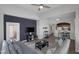Bright living room offering kitchen views, sleek floors, contemporary furniture and easy outdoor access at 10001 Peace Way # 2351, Las Vegas, NV 89147