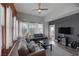 Bright living room offering plenty of natural light, comfortable furniture and easy outdoor access at 10001 Peace Way # 2351, Las Vegas, NV 89147