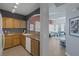 View into the spacious living area from the kitchen, great for entertaining and Gathering time at 10001 Peace Way # 2351, Las Vegas, NV 89147