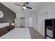 Bright bedroom features sleek floors, closet space, and ensuite bathroom access at 10001 Peace Way # 2351, Las Vegas, NV 89147