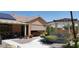 Backyard featuring a covered patio, gazebo, beautiful landscaping, and outdoor seating providing a relaxing space at 10015 Wonderful Day Dr, Las Vegas, NV 89148