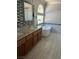 Modern bathroom featuring a double vanity, soaking tub, and decorative tile accents at 10974 Fintry Hills St, Las Vegas, NV 89141