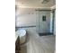 Bright bathroom with soaking tub and modern shower featuring decorative tile accents at 10974 Fintry Hills St, Las Vegas, NV 89141