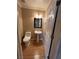 Cozy bathroom features hardwood floors, a sink, and a toilet at 10974 Fintry Hills St, Las Vegas, NV 89141