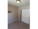 This bedroom features neutral walls, carpet, and a closet with sliding doors at 10974 Fintry Hills St, Las Vegas, NV 89141