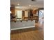 Kitchen features an island, stainless steel appliances, and granite countertops at 10974 Fintry Hills St, Las Vegas, NV 89141