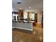 Spacious kitchen featuring an island, stainless steel appliances, and bar seating at 10974 Fintry Hills St, Las Vegas, NV 89141
