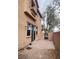 Backyard view of stucco wall and the sliding glass door that leads inside at 11083 Ketchikan St, Las Vegas, NV 89179