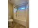 Bathroom with white tiled shower and bathtub combination at 11083 Ketchikan St, Las Vegas, NV 89179