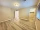 Bedroom with wood flooring, walk-in closet, and a neutral paint color at 11083 Ketchikan St, Las Vegas, NV 89179