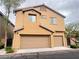 Two-car garage with a clean facade, blending seamlessly with the home's exterior at 11083 Ketchikan St, Las Vegas, NV 89179