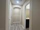 Hallway with doorways leading to a bathroom and other rooms at 11083 Ketchikan St, Las Vegas, NV 89179