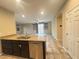 Open-concept kitchen with granite countertops, stainless appliances, and tile flooring at 11083 Ketchikan St, Las Vegas, NV 89179