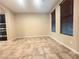 Open living space with tile flooring and natural light at 11083 Ketchikan St, Las Vegas, NV 89179