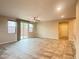 Spacious living area with tile flooring, large windows, and plenty of natural light at 11083 Ketchikan St, Las Vegas, NV 89179