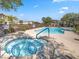 Community pool and jacuzzi area with mountain views at 11083 Ketchikan St, Las Vegas, NV 89179